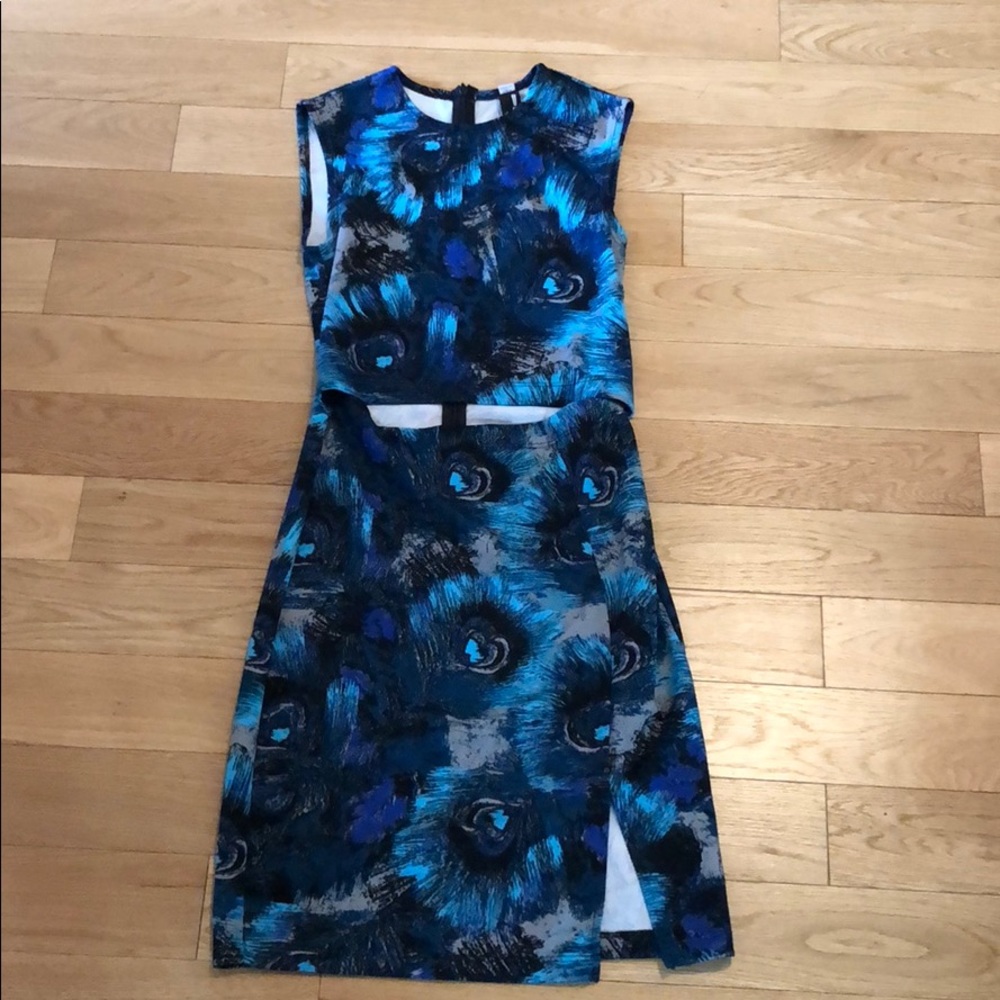Blue mini dress with exposed stomach & thigh slit